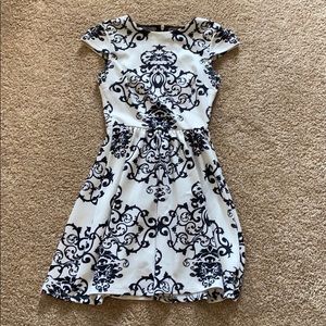 Black and white design dress with mesh back